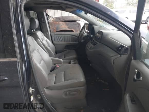 2008 Honda Odyssey EX-L with VIN 5FNRL38678B085411, listed as a IAAI auction lot 43015457 with 206,565 mi miles and . Bid and sale history available at DreamBid. Image 5.