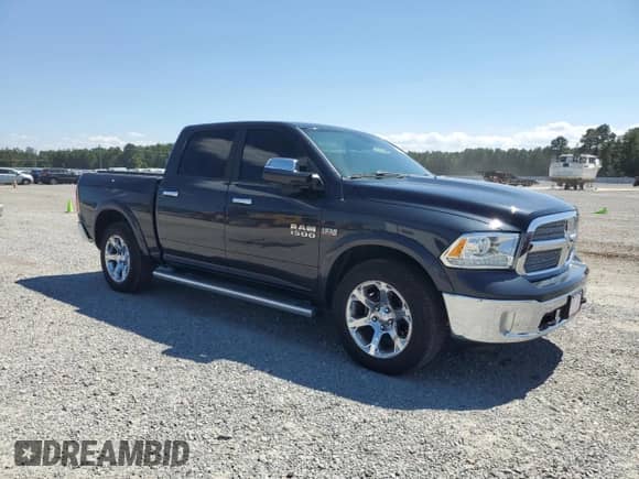 2013 Ram 1500 Laramie with VIN 1C6RR7NT6DS635850, listed as a Copart auction lot 70987255 with 138,927 mi miles and Salvage title. Bid and sale history available at DreamBid. Image 4.