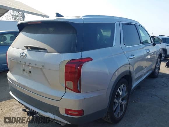2021 Hyundai Palisade SEL with VIN KM8R44HEXMU305261, listed as a IAAI auction lot 42956509 with 79,930 mi miles and . Bid and sale history available at DreamBid. Image 4.