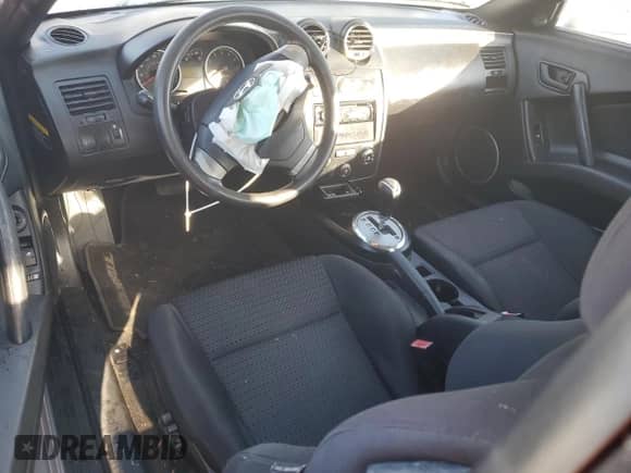 2008 Hyundai Tiburon GS с VIN KMHHM66D18U280905, выставлен на аукционе Copart как лот 80122744 с пробегом 116 473 миль миль и Списание • Salvage title. История ставок и продаж доступна на DreamBid. Изображение 8.