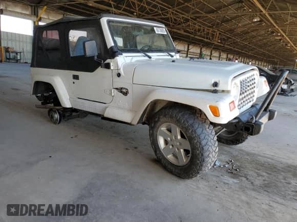 1997 Jeep Wrangler Sahara with VIN 1J4FY49S6VP523577, listed as a Copart auction lot 66736805 with 194,481 mi miles and Salvage title. Bid and sale history available at DreamBid. Image 4.