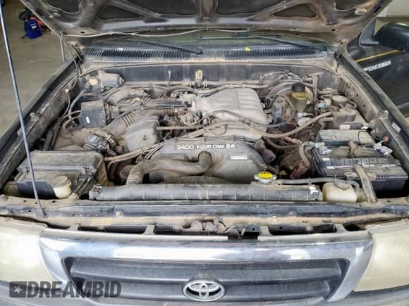 1998 Toyota Tacoma z VIN 4TAWN72N8WZ077681, wystawiony jako Copart lot #84891125 z przebiegiem 154 484 mil mil oraz Czysty tytuł • Clean title. Historia ofert i sprzedaży dostępna na DreamBid. Obrazek 11.