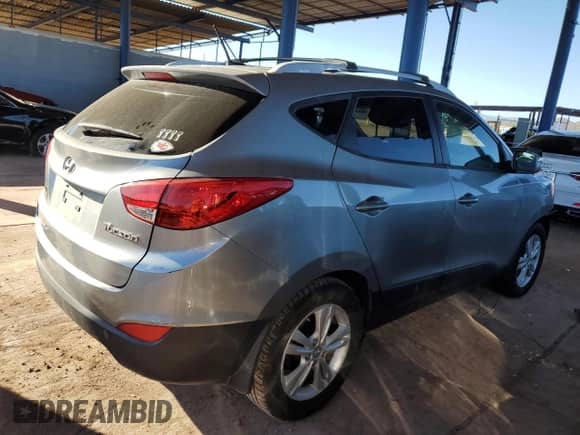 2013 Hyundai Tucson Limited с VIN KM8JU3ACXDU768694, выставлен на аукционе Copart как лот 81956975 с пробегом 140 340 миль миль и Списание • Salvage title. История ставок и продаж доступна на DreamBid. Изображение 3.