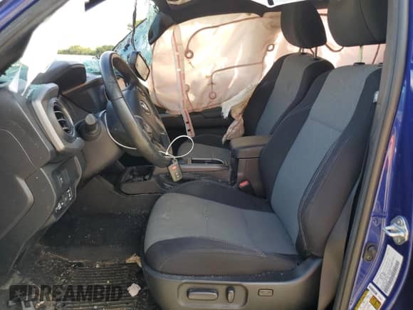 2022 Toyota Tacoma SR5 with VIN 3TYDZ5BN0NT005849, listed as a Copart auction lot 71113125 with 63,449 mi miles and Salvage title. Bid and sale history available at DreamBid. Image 7.