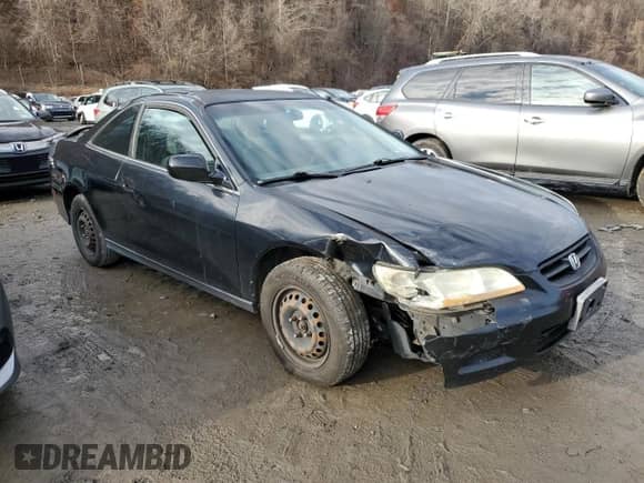 2002 Honda Accord LX with VIN 1HGCG32632A022245, listed as a Copart auction lot 85084814 with 147,767 mi miles and Salvage title. Bid and sale history available at DreamBid. Image 4.