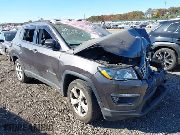 2021 Jeep Compass Latitude with VIN 3C4NJDBB8MT537958, listed as a IAAI auction lot 40705924 with 73,319 mi miles and . Bid and sale history available at DreamBid. Image 1.