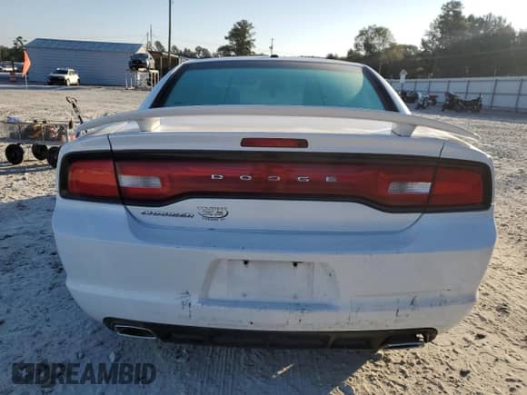 2013 Dodge Charger SXT Plus с VIN 2C3CDXHG4DH555745, выставлен на аукционе Copart как лот 81965075 с пробегом 310 730 миль миль и Списание • Salvage title. История ставок и продаж доступна на DreamBid. Изображение 6.