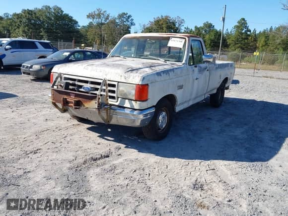 1991 Ford F-150 z VIN 1FTDF15Y2MNA10655, wystawiony jako IAAI lot #43471768 z przebiegiem 82 978 mil mil oraz . Historia ofert i sprzedaży dostępna na DreamBid. Obrazek 2.