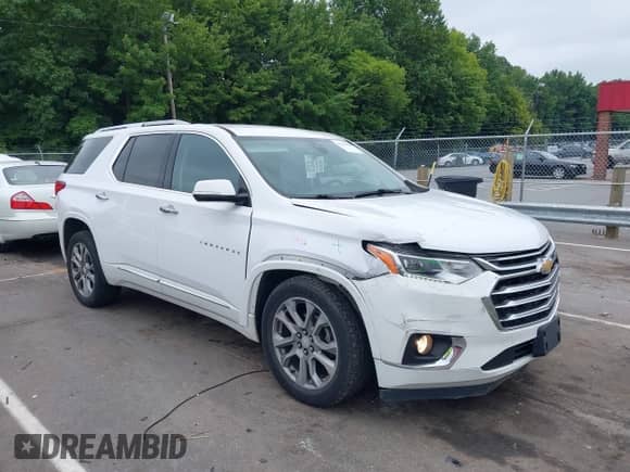 2018 Chevrolet Traverse Premier with VIN 1GNEVJKW7JJ218518, listed as a IAAI auction lot 42876202 with 105,178 mi miles and . Bid and sale history available at DreamBid. Image 1.