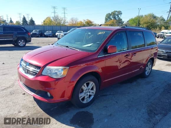 2011 Dodge Grand Caravan Crew with VIN 2D4RN5DG3BR674586, listed as a IAAI auction lot 43530833 with 233,580 mi miles and . Bid and sale history available at DreamBid. Image 2.