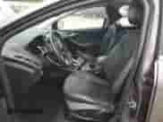 2012 Ford Focus Titanium z VIN 1FAHP3N26CL412510, wystawiony jako Copart lot #84207115 z przebiegiem 125 005 mil mil oraz Czysty tytuł • Clean title. Historia ofert i sprzedaży dostępna na DreamBid. Obrazek 7.