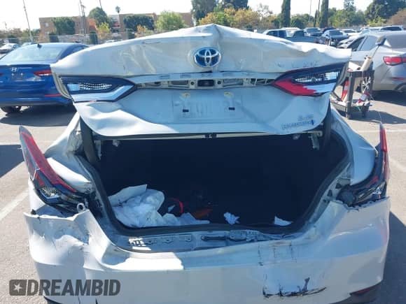 2022 Toyota Camry Hybrid LE with VIN 4T1C31AK1NU036253, listed as a IAAI auction lot 43313594 with 37,078 mi miles and . Bid and sale history available at DreamBid. Image 16.