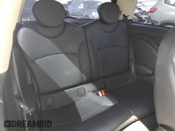 2011 MINI Hardtop with VIN WMWSU3C52BT096248, listed as a Copart auction lot 62008285 with 129,794 mi miles and Salvage title. Bid and sale history available at DreamBid. Image 10.