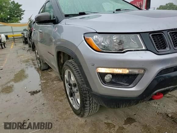 2019 Jeep Compass Trailhawk with VIN 3C4NJDDB7KT671080, listed as a Copart auction lot 60645655 with 131,581 mi miles and Salvage title. Bid and sale history available at DreamBid. Image 14.
