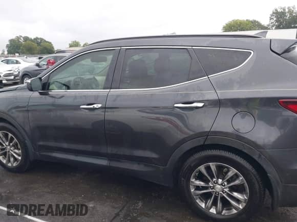 2018 Hyundai Santa Fe 2.0T with VIN 5XYZU4LA1JG529573, listed as a IAAI auction lot 43307903 with 83,585 mi miles and . Bid and sale history available at DreamBid. Image 14.