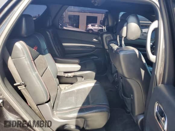 2016 Dodge Durango R/T with VIN 1C4SDJCT6GC352453, listed as a Copart auction lot 84751075 with 171,389 mi miles and Salvage title. Bid and sale history available at DreamBid. Image 11.