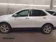 2018 Chevrolet Equinox Premier z VIN 2GNAXMEVXJ6286421, wystawiony jako IAAI lot #42820265 z przebiegiem 226 355 mil mil oraz . Historia ofert i sprzedaży dostępna na DreamBid. Obrazek 15.