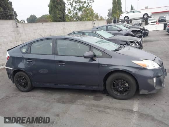 2015 Toyota Prius Four z VIN JTDKN3DU3F0444670, wystawiony jako IAAI lot #43155727 z przebiegiem 108 649 mil mil oraz . Historia ofert i sprzedaży dostępna na DreamBid. Obrazek 13.