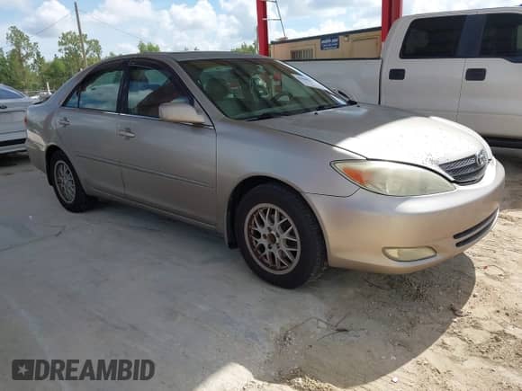 2004 Toyota Camry LE with VIN 4T1BE32K94U852822, listed as a IAAI auction lot 42900301 with 253,454 mi miles and . Bid and sale history available at DreamBid. Image 1.