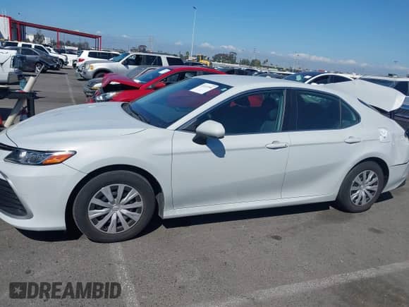 2022 Toyota Camry Hybrid LE with VIN 4T1C31AK1NU036253, listed as a IAAI auction lot 43313594 with 37,078 mi miles and . Bid and sale history available at DreamBid. Image 14.