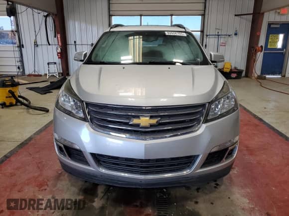 2016 Chevrolet Traverse LT z VIN 1GNKVHKD7GJ324342, wystawiony jako Copart lot #82656765 z przebiegiem 81 121 mil mil oraz Czysty tytuł • Clean title. Historia ofert i sprzedaży dostępna na DreamBid. Obrazek 5.