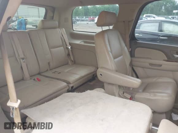 2010 Chevrolet Tahoe LTZ with VIN 1GNUKCE03AR101284, listed as a IAAI auction lot 42489604 with 196,786 mi miles and . Bid and sale history available at DreamBid. Image 8.