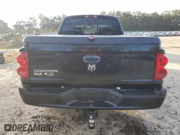 2007 Dodge Dakota SLT с VIN 1D7HE48K37S216916, выставлен на аукционе Copart как лот 87187984 с пробегом 166 160 миль миль и Списание • Salvage title. История ставок и продаж доступна на DreamBid. Изображение 6.