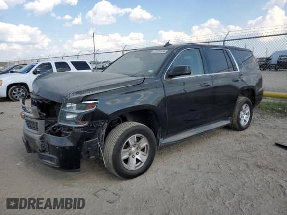2016 Chevrolet Tahoe with VIN 1GNLCDKCXGR325884, listed as a Copart auction lot 71559534 with 74,080 mi miles and Salvage title. Bid and sale history available at DreamBid. Image 1.