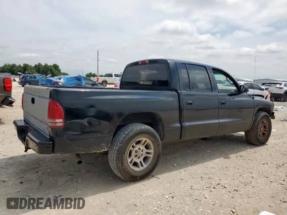 2001 Dodge Dakota Sport with VIN 1B7GL2AX71S155759, listed as a Copart auction lot 59165735 with 276,247 mi miles and Salvage title. Bid and sale history available at DreamBid. Image 3.
