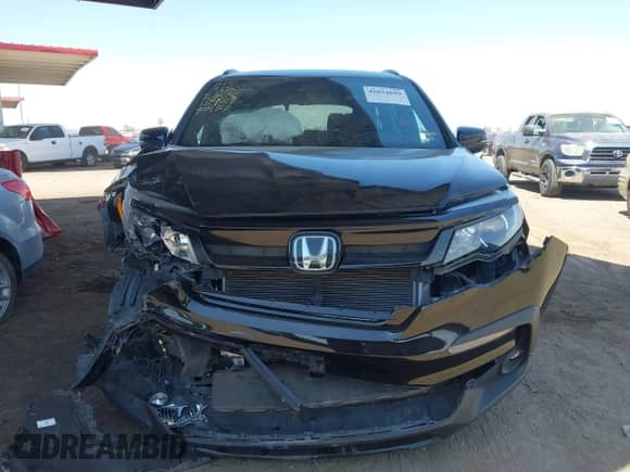 2022 Honda Pilot Sport with VIN 5FNYF6H38NB090932, listed as a IAAI auction lot 42654699 with Not provided miles and . Bid and sale history available at DreamBid. Image 6.