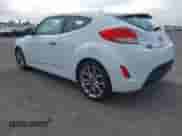 2014 Hyundai Veloster z VIN KMHTC6ADXEU213073, wystawiony jako IAAI lot #41551346 z przebiegiem 130 549 mil mil oraz . Historia ofert i sprzedaży dostępna na DreamBid. Obrazek 3.