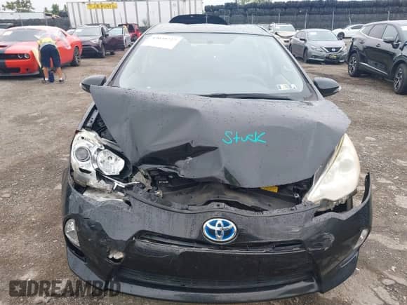 2013 Toyota Prius One z VIN JTDKDTB3XD1545063, wystawiony jako IAAI lot #43039727 z przebiegiem Nie podano mil oraz . Historia ofert i sprzedaży dostępna na DreamBid. Obrazek 12.