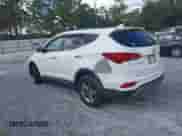 2017 Hyundai Santa Fe 2.4L z VIN 5NMZUDLBXHH027377, wystawiony jako IAAI lot #43341936 z przebiegiem 94 975 mil mil oraz . Historia ofert i sprzedaży dostępna na DreamBid. Obrazek 3.