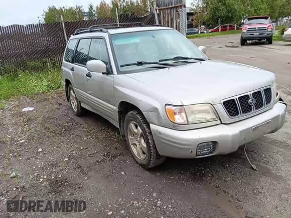 2001 Subaru Forester S with VIN JF1SF65631H723339, listed as a Copart auction lot 69153995 with 180,657 mi miles and Salvage title. Bid and sale history available at DreamBid. Image 13.