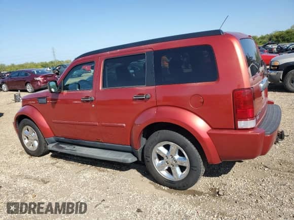 2007 Dodge Nitro SLT z VIN 1D8GU58K17W569874, wystawiony jako Copart lot #84255575 z przebiegiem 76 806 mil mil oraz Szkoda całkowita • Salvage title. Historia ofert i sprzedaży dostępna na DreamBid. Obrazek 2.