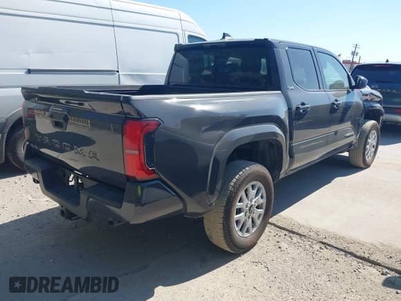 2024 Toyota Tacoma TRD Off Road with VIN 3TMLB5JN7RM022960, listed as a IAAI auction lot 43431604 with 25,332 mi miles and . Bid and sale history available at DreamBid. Image 4.