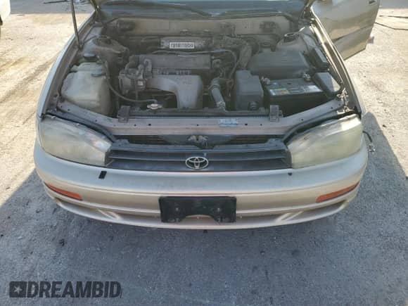 1993 Toyota Camry LE z VIN JT2SK12E5P0127296, wystawiony jako Copart lot #53287135 z przebiegiem 210 714 mil mil oraz Szkoda całkowita • Salvage title. Historia ofert i sprzedaży dostępna na DreamBid. Obrazek 13.