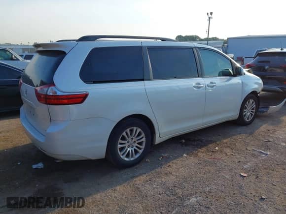 2015 Toyota Sienna XLE with VIN 5TDYK3DC5FS644523, listed as a IAAI auction lot 43248015 with 106,854 mi miles and . Bid and sale history available at DreamBid. Image 4.