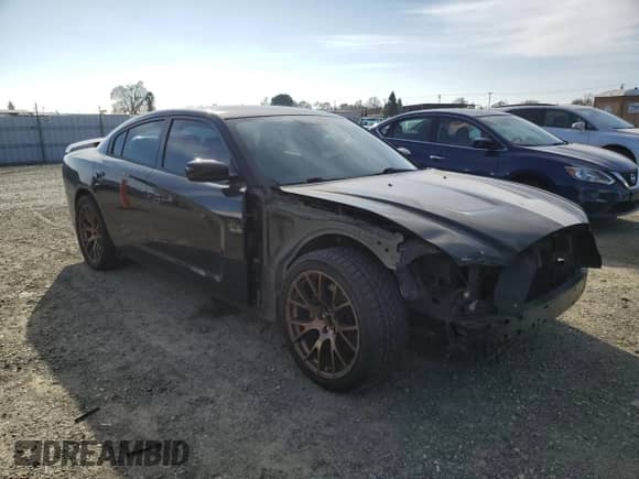 2013 Dodge Charger SRT-8 Super Bee with VIN 2C3CDXGJ7DH552318, listed as a Copart auction lot 87907595 with 79,630 mi miles and Salvage title. Bid and sale history available at DreamBid. Image 4.