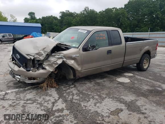2004 Ford F-150 XL with VIN 1FTVX14544NB37254, listed as a Copart auction lot 58550985 with 256,441 mi miles and Salvage title. Bid and sale history available at DreamBid. Image 1.