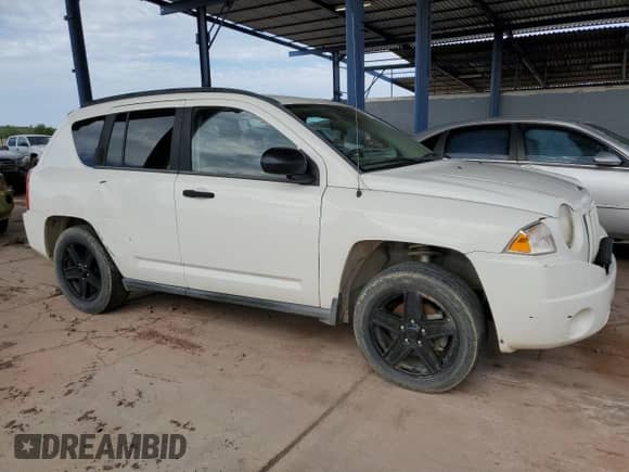 2007 Jeep Compass Sport with VIN 1J8FT47W37D145824, listed as a Copart auction lot 70866745 with 193,992 mi miles and Clean title. Bid and sale history available at DreamBid. Image 4.