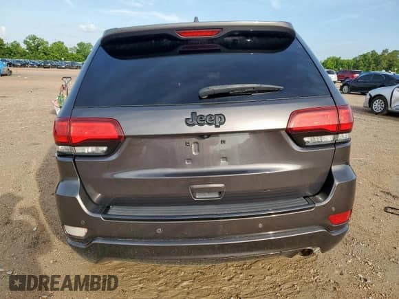2018 Jeep Grand Cherokee Laredo E with VIN 1C4RJEAG0JC322747, listed as a Copart auction lot 60547435 with 109,935 mi miles and Salvage title. Bid and sale history available at DreamBid. Image 6.