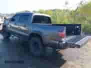 2020 Toyota Tacoma SR5 with VIN 5TFCZ5AN4LX237581, listed as a IAAI auction lot 43191708 with 126,946 mi miles and . Bid and sale history available at DreamBid. Image 3.