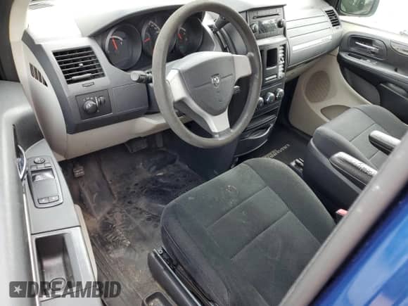 2010 Dodge Grand Caravan Cargo with VIN 2D4RN1AE3AR348801, listed as a Copart auction lot 68098685 with 313,499 mi miles and Clean title. Bid and sale history available at DreamBid. Image 8.