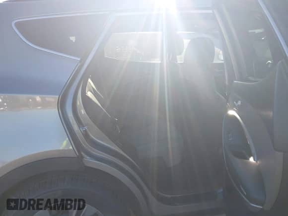 2016 Hyundai Santa Fe with VIN 5XYZU3LB3GG335302, listed as a IAAI auction lot 43344298 with 96,878 mi miles and . Bid and sale history available at DreamBid. Image 8.