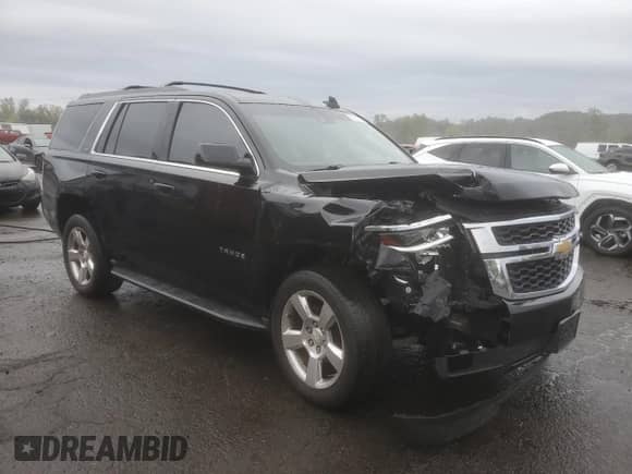 2015 Chevrolet Tahoe LT с VIN 1GNSKBKC5FR688899, выставлен на аукционе Copart как лот 81311665 с пробегом 165 706 миль миль и Списание • Salvage title. История ставок и продаж доступна на DreamBid. Изображение 4.