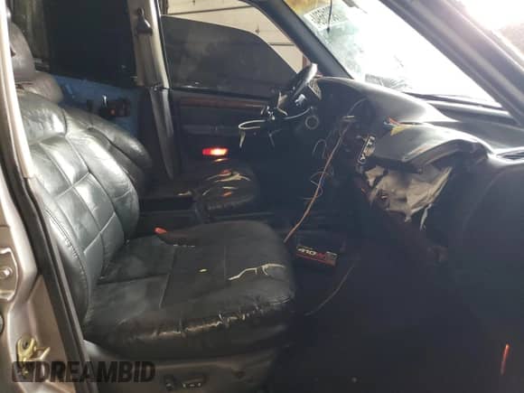 1998 Jeep Grand Cherokee Limited z VIN 1J4GZ78S9WC308708, wystawiony jako Copart lot #79315694 z przebiegiem 205 976 mil mil oraz Szkoda całkowita • Salvage title. Historia ofert i sprzedaży dostępna na DreamBid. Obrazek 7.