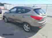 2011 Hyundai Tucson GLS with VIN KM8JU3ACXBU129695, listed as a IAAI auction lot 43393980 with 173,375 mi miles and . Bid and sale history available at DreamBid. Image 3.