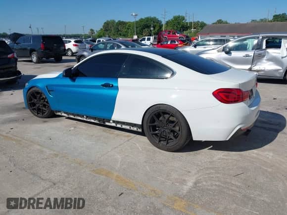 2018 BMW 4 Series 440i with VIN WBA4W7C59JAB87539, listed as a IAAI auction lot 41895024 with 73,228 mi miles and . Bid and sale history available at DreamBid. Image 3.