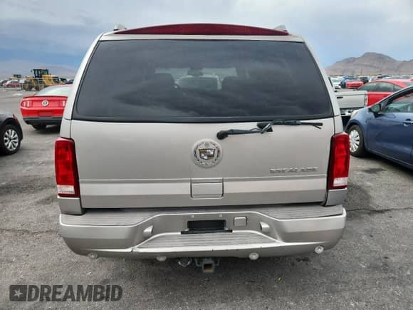 2004 Cadillac Escalade with VIN 1GYEC63T64R285823, listed as a Copart auction lot 59167915 with 289,955 mi miles and Salvage title. Bid and sale history available at DreamBid. Image 6.